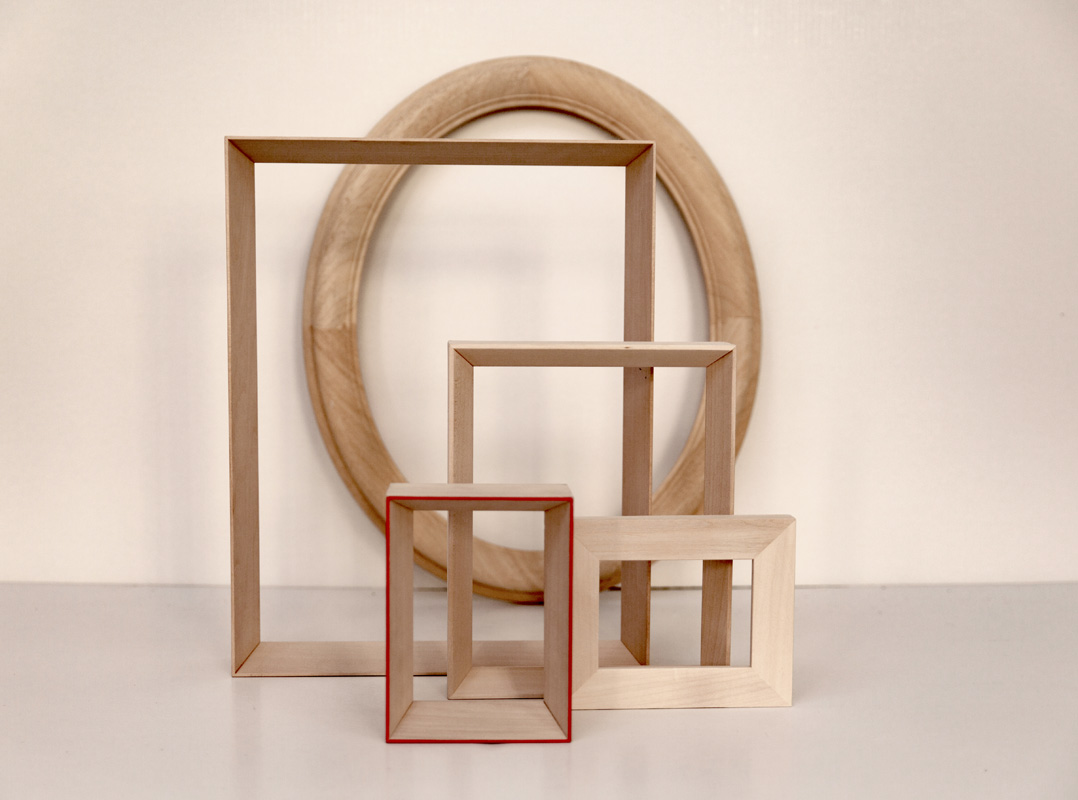 Cornici in essenza di tiglio e ciliegio naturale